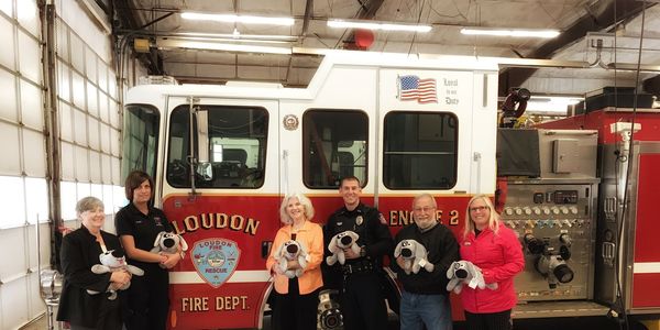 Fifty "Trouble the Dog" stuffed animals were delivered to the Loudon Police and Fire departments on Thursday.