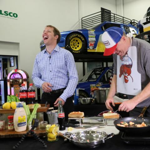 New England’s Comedian Jimmy Dunn (right) visited NASCAR Cup Series driver Brad Keselowski (left) earlier this week to preview next weekend’s Foxwoods Resort Casino 301 and have a little fun teaching the defending race winner how to prepare the perfect lobster roll.