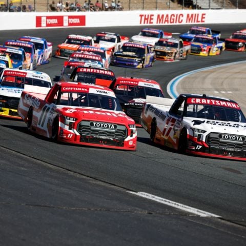 TRICON Garage teammates Corey Heim, driver of the No. 11 Toyota Tundra, and Seekonk, Mass. native Gio Ruggiero, driver of the No. 17, lead the field through turn four during the Team EJP 175 NASCAR CRAFTSMAN Truck Series race at New Hampshire Motor Speedway on Sept. 20, 2025.