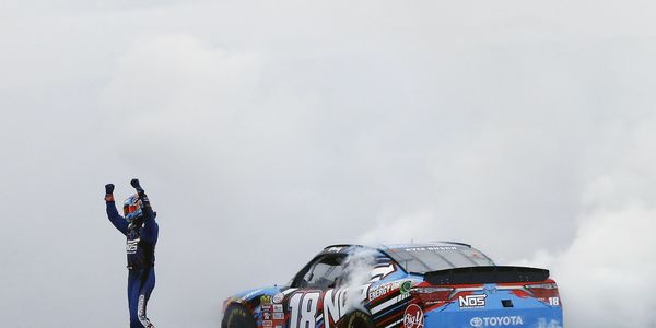 Kyle Busch celebrates the 175th victory of his NASCAR career after winning Saturday's Overton's 200 XFINITY Series race.