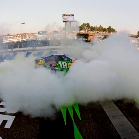 Then one-time NASCAR Cup Series champion Kyle Busch does a burnout to celebrate winning the NASCAR Cup Series playoff race at New Hampshire Motor Speedway on Sept. 24, 2017.
