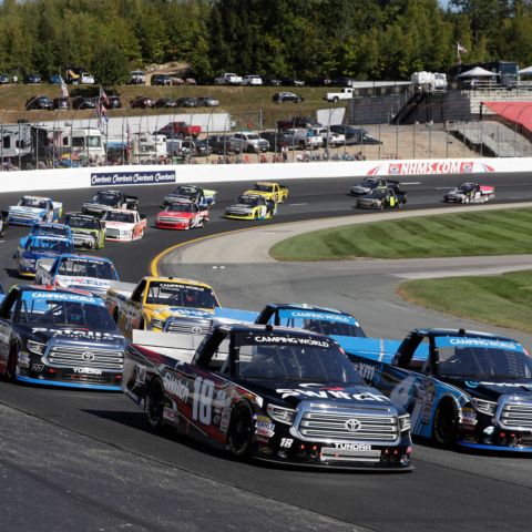 Current NASCAR Cup Series drivers Noah Gragson (No. 18) and Christopher Bell (No. 4) lead the NASCAR CRAFTSMAN Truck Series field to the restart zone at New Hampshire Motor Speedway on Sept. 23, 2017.