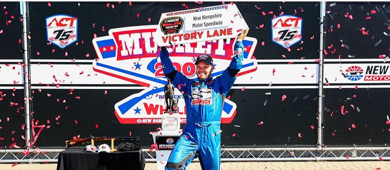 NASCAR Whelen Modified Tour driver Bobby Santos III celebrates in victory lane after winning the Musket 200 presented by Whelen during the third annual Full Throttle Fall Weekend at New Hampshire Motor Speedway on Sept. 12, 2020