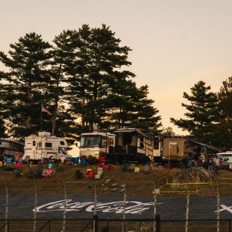 The campsites in the N4 Lot at New Hampshire Motor Speedway overlook the backstretch of “The Magic Mile.”