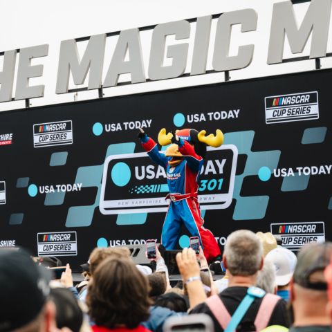 Milo the Moose hypes up the Track Pass holders to kick off NASCAR Cup Series pre-race ceremonies and driver introductions at New Hampshire Motor Speedway on June 23, 2024.