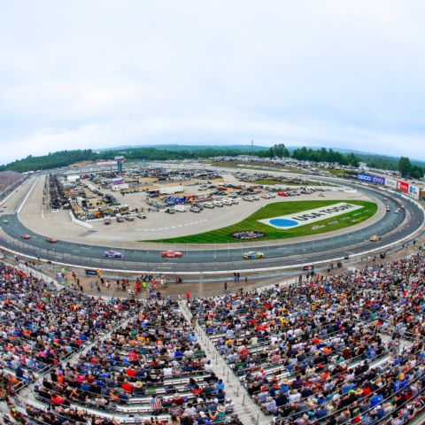The NASCAR Cup Series field in turns one and two at New Hampshire Motor Speedway on June 23, 2024.