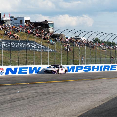 NASCAR Cup Series driver Denny Hamlin races down the backstretch of “The Magic Mile” during the July 21, 2019 Foxwoods Resort Casino 301 at New Hampshire Motor Speedway.